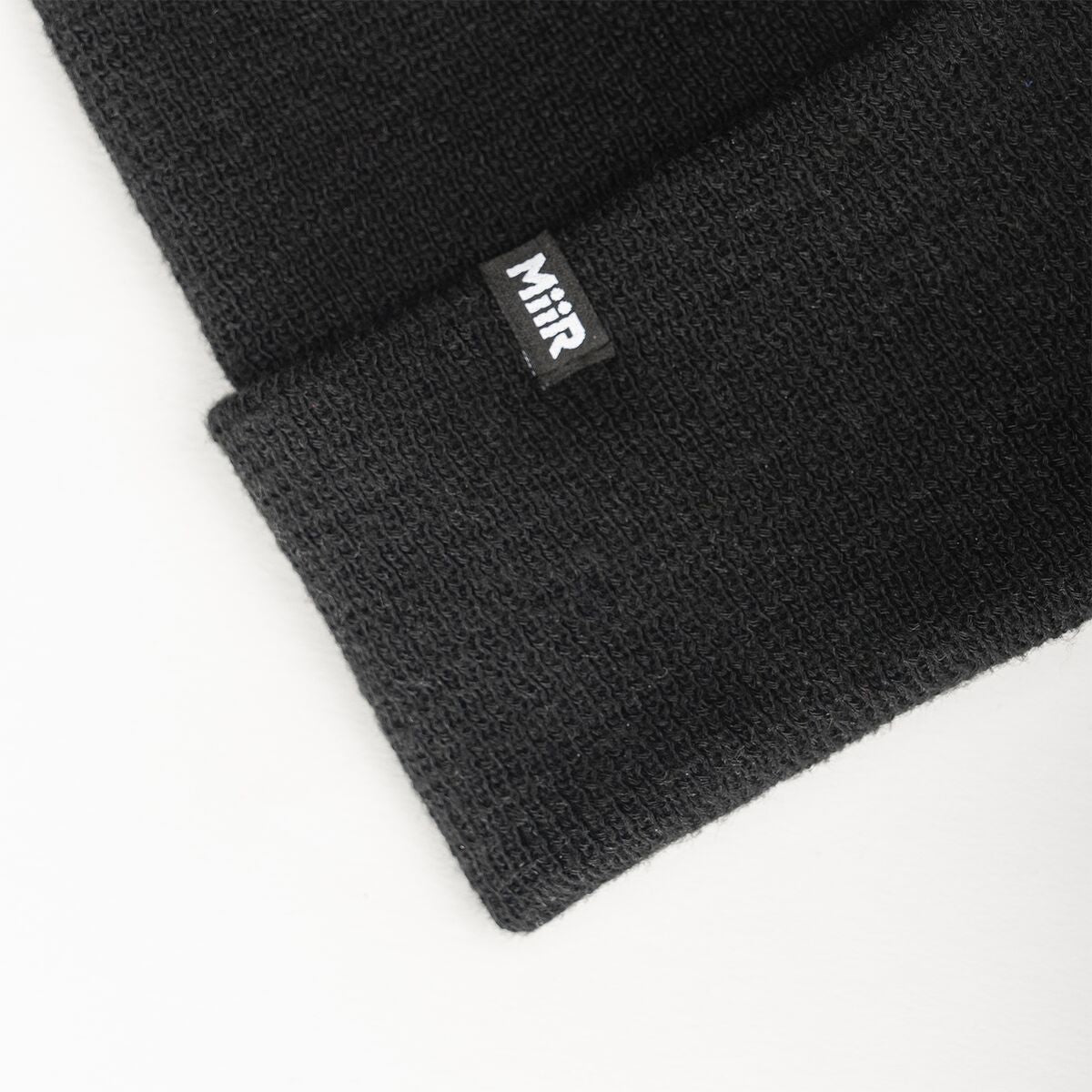 recycled-poly-fine-knit-beanie-p9 WebPDP-RecycledPolyFineKnitBeanie_Studio_TagDetail_Black__BNE005002OS.jpg